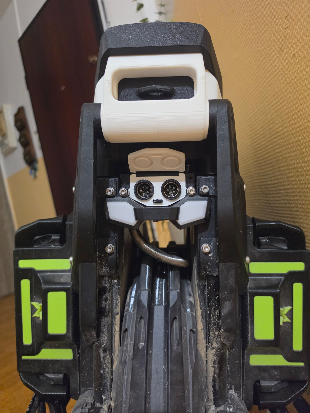 IXEZED 3D printed charging port cover fitted on a Leaperkim Lynx — view 5